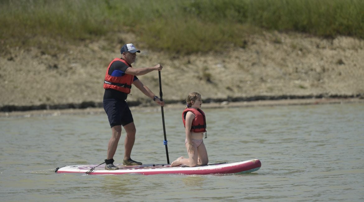 Paddle boarding at Water park in Suffolk